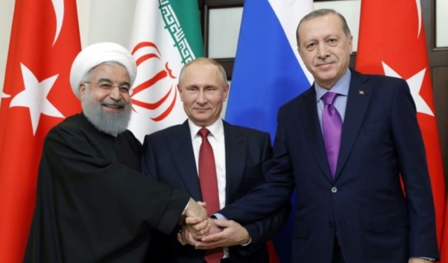 Syrie: Poutine rallie Erdogan et Rohani à l'idée d'une réunion politique en Russie