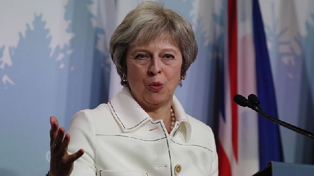 G7: Theresa May met en garde contre les mesures unilatérales